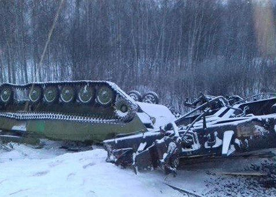 Судя по всему, состав вез военную технику.