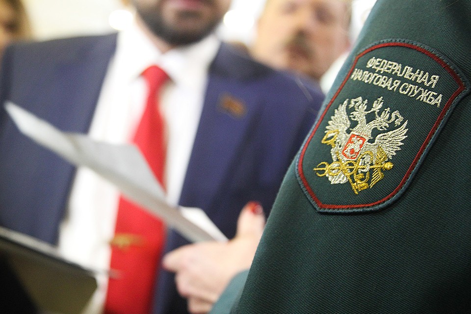 Ставка налога на дивиденды, которые выводятся за границу, вырастет с 2% до 15%. Фото: Максим Стулов, Ведомости/ТАСС